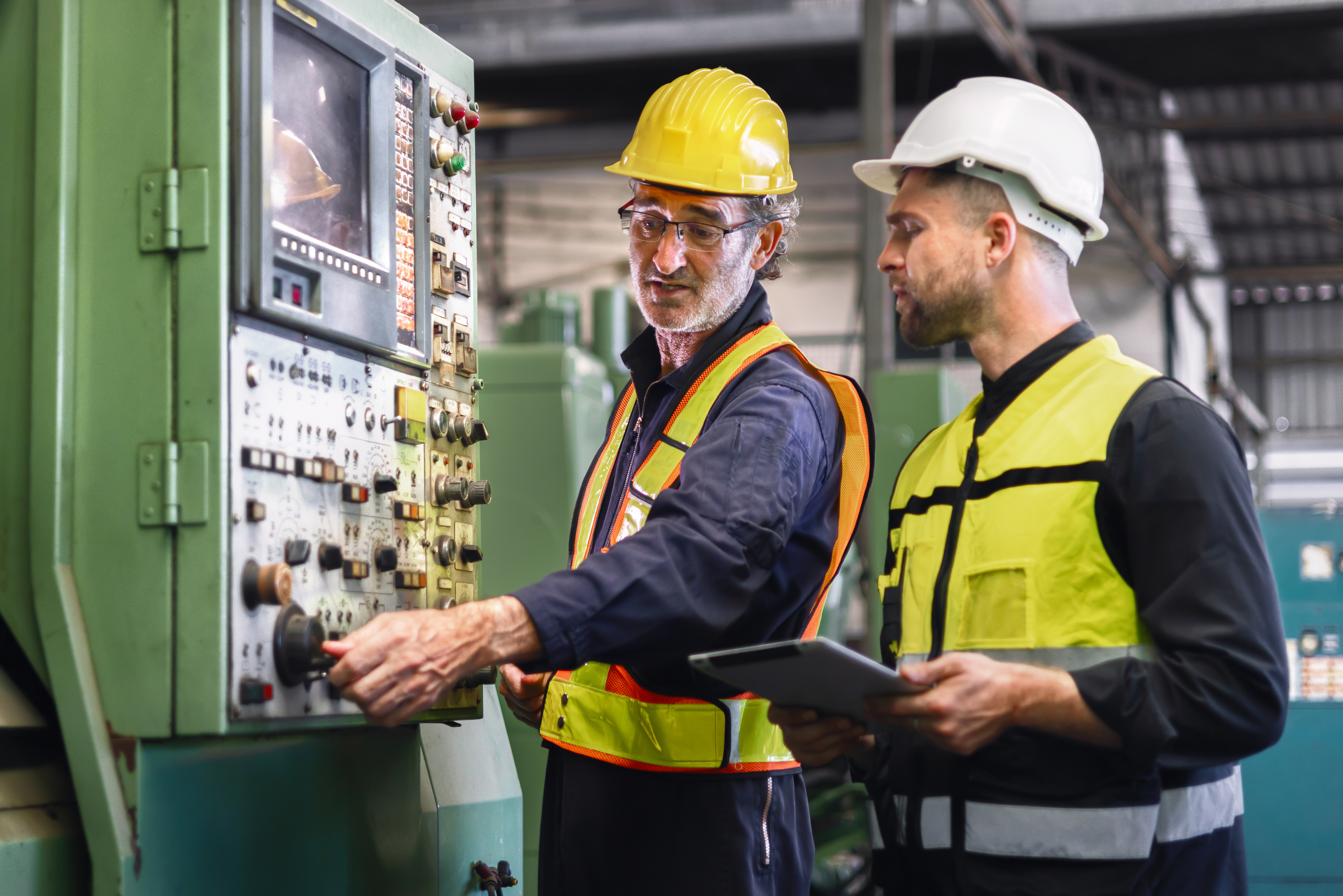 worker and engineer inspection and checking production process o